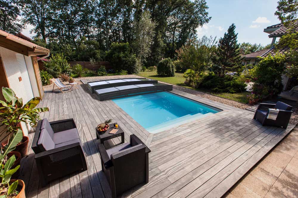Copertura telescopica ultra bassa cristal per piscina Copertura telescopica ultra bassa cristal
